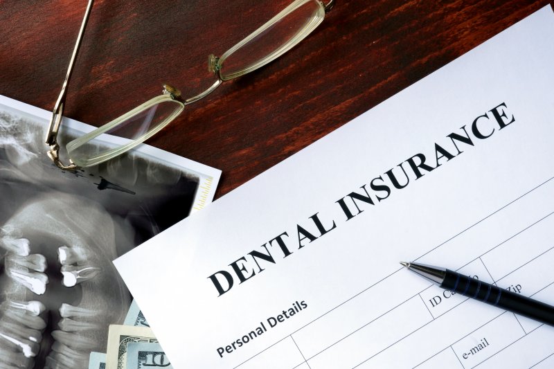 a dental insurance form next to an X-ray image